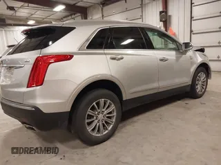 2017 Cadillac XT5 Premium Luxury AWD with VIN 1GYKNERS1HZ282954, listed as a IAAI auction lot 41217097 with 63,154 mi miles. Bid and sale history available at carsss.com. Image 4.