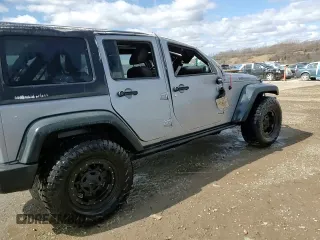 2016 Jeep Wrangler Unlimited Sport with VIN 1C4BJWDG1GL146772, listed as a Copart auction lot 49782385 with 87,286 mi miles and Salvage Title. Bid and sale history available at DreamBid. Image 14.