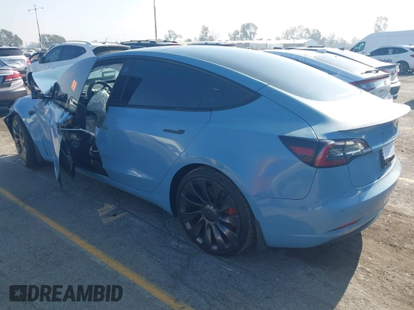 2022 Tesla Model 3 Performance with VIN 5YJ3E1EC1NF144236, listed as a IAAI auction lot 41189644 with Not Provided miles. Bid and sale history available at carsss.com. Image 3.