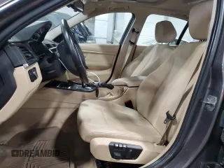 2014 BMW 3 Series 328i xDrive with VIN WBA3B5G50ENS10367, listed as a Copart auction lot 61578605 with 79,934 mi miles and Salvage title. Bid and sale history available at DreamBid. Image 7.