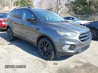 2017 Ford Escape SE with VIN 1FMCU9GD9HUC84906, listed as a IAAI auction lot 41762989 with 147,721 mi miles. Bid and sale history available at carsss.com. Image 1.