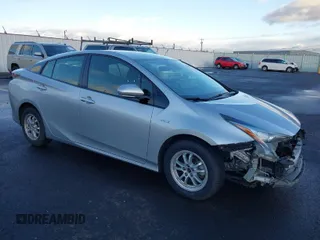 2018 Toyota Prius Two with VIN JTDKARFU8J3547408, listed as a IAAI auction lot 41313198 with 76,060 mi miles. Bid and sale history available at carsss.com. Image 1.