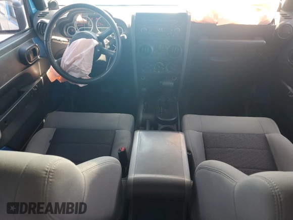 2010 Jeep Wrangler Sport с VIN 1J4AA2D12AL169186, выставлен на аукционе Copart как лот 57546115 с пробегом 277 897 миль миль и Списание • Salvage title. История ставок и продаж доступна на DreamBid. Изображение 8.