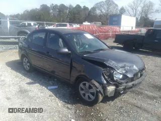 2006 Hyundai Accent GLS with VIN KMHCN46C66U027692, listed as a IAAI auction lot 41796140 with 233,488 mi miles. Bid and sale history available at carsss.com. Image 1.