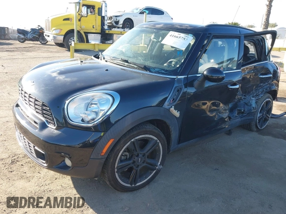 2013 MINI Countryman S z VIN WMWZC3C57DWP22928, wystawiony jako IAAI lot #41665753 z przebiegiem Nie podano mil oraz . Historia ofert i sprzedaży dostępna na DreamBid. Obrazek 17.