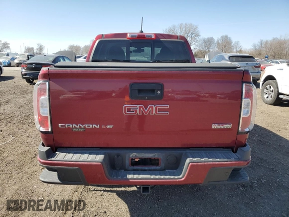 2019 GMC Canyon 4WD All Terrain z VIN 1GTG6FEN6K1169148, wystawiony jako Copart lot #51084645 z przebiegiem 81 107 mil mil oraz Szkody całkowita. Historia ofert i sprzedaży dostępna na DreamBid. Obrazek 6.