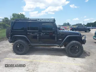 2012 Jeep Wrangler Unlimited Altitude with VIN 1C4HJWEG5CL161049, listed as a IAAI auction lot 42629330 with 217,147 mi miles and . Bid and sale history available at DreamBid. Image 13.