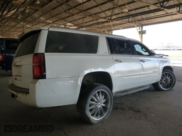 2015 Chevrolet Suburban LT z VIN 1GNSCJKC3FR585391, wystawiony jako Copart lot #88498085 z przebiegiem Nie podano mil oraz Szkoda całkowita • Salvage title. Historia ofert i sprzedaży dostępna na DreamBid. Obrazek 3.