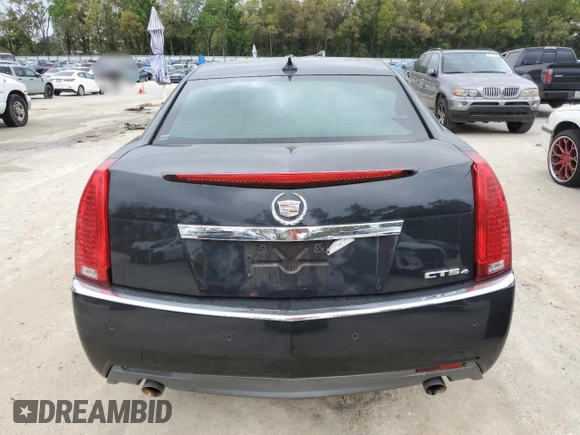 2009 Cadillac CTS AWD w/1SA with VIN 1G6DH577590123416, listed as a Copart auction lot 48297495 with 142,728 mi miles and Salvage Title. Bid and sale history available at carsss.com. Image 6.