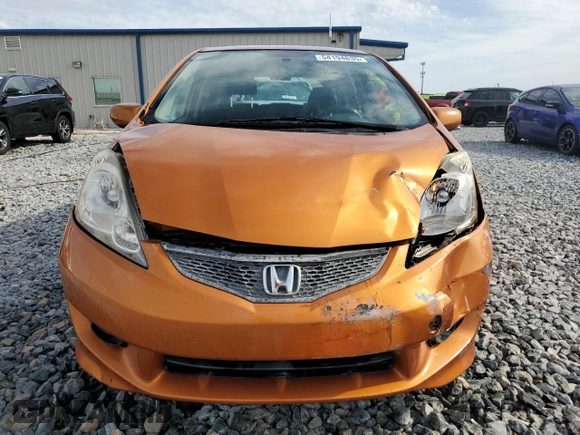 2011 Honda Fit Sport with VIN JHMGE8H59BC007883, listed as a Copart auction lot 54194635 with 123,256 mi miles and Salvage Title. Bid and sale history available at DreamBid. Image 5.