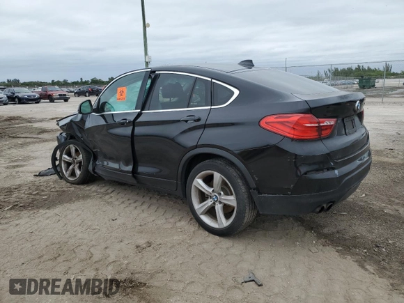 2015 BMW X4 xDrive28i with VIN 5UXXW3C51F0M88632, listed as a Copart auction lot 82401313 with 0 mi miles. Bid and sale history available at carsss.com. Image 2.
