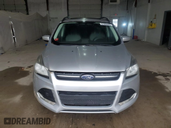 2014 Ford Escape SE z VIN 1FMCU9G97EUC43696, wystawiony jako Copart lot #57409665 z przebiegiem 68 586 mil mil oraz Czysty tytuł • Clean title. Historia ofert i sprzedaży dostępna na DreamBid. Obrazek 5.