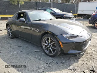 2021 Mazda MX-5 Miata Grand Touring with VIN JM1NDAM71M0451354, listed as a Copart auction lot 47756025 with 53,347 mi miles and Salvage title. Bid and sale history available at DreamBid. Image 4.