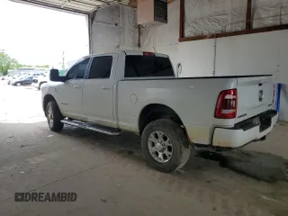 2023 Ram 2500 Laramie with VIN 3C6UR5FL2PG632162, listed as a Copart auction lot 56220575 with 59,902 mi miles and Salvage title. Bid and sale history available at DreamBid. Image 2.