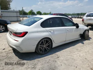 2022 BMW 3 Series 330i with VIN 3MW5R1J06N8C31334, listed as a Copart auction lot 52724395 with 36,445 mi miles and Salvage Title. Bid and sale history available at carsss.com. Image 3.