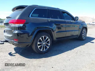 2017 Jeep Grand Cherokee Overland with VIN 1C4RJFCG0HC844713, listed as a IAAI auction lot 42293301 with 83,791 mi miles and . Bid and sale history available at DreamBid. Image 4.