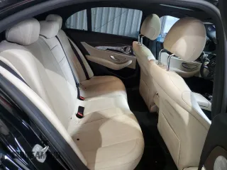 2018 Mercedes-Benz E-Class E 300 with VIN WDDZF4JBXJA374002, listed as a Copart auction lot 42376925 with 136,184 mi miles and Salvage Title. Bid and sale history available at carsss.com. Image 10.