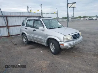 2000 Suzuki Grand Vitara JLX z VIN JS3TD62V5Y4117740, wystawiony jako IAAI lot #42088696 z przebiegiem 166 484 mil mil oraz . Historia ofert i sprzedaży dostępna na DreamBid. Obrazek 1.
