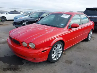 2002 Jaguar X-Type w/Sport Pkg with VIN SAJEA53D12XC36640, listed as a IAAI auction lot 41242631 with 183,492 mi miles. Bid and sale history available at carsss.com. Image 17.