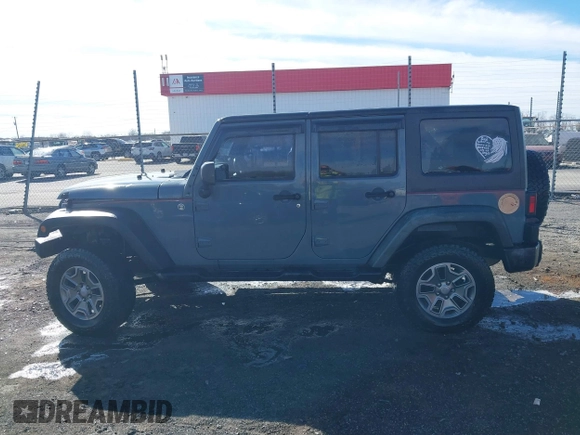 2015 Jeep Wrangler Unlimited Willys Wheeler with VIN 1C4BJWDG4FL589822, listed as a IAAI auction lot 41732614 with 149,112 mi miles and . Bid and sale history available at DreamBid. Image 15.