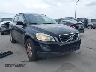 2010 Volvo XC60 3.2L with VIN YV4982DLXA2100979, listed as a IAAI auction lot 42105046 with 129,840 mi miles. Bid and sale history available at carsss.com. Image 1.