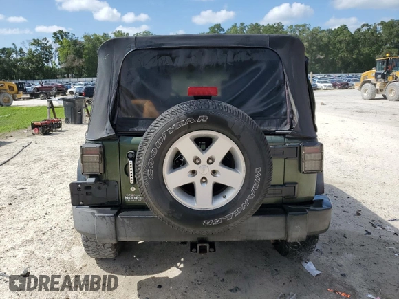 2008 Jeep Wrangler Unlimited X with VIN 1J4GA39118L633877, listed as a Copart auction lot 63652795 with 129,856 mi miles and Clean title. Bid and sale history available at DreamBid. Image 6.