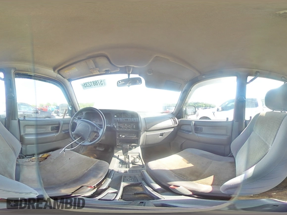 1999 Isuzu Trooper S with VIN JACDJ58X6X7924973, listed as a Copart auction lot 57881235 with 269,301 mi miles and Salvage title. Bid and sale history available at DreamBid. Image 14.