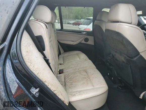 2012 BMW X5 35i z VIN 5UXZV4C5XCL748652, wystawiony jako Copart lot #55457455 z przebiegiem 149 030 mil mil oraz Szkoda całkowita • Salvage title. Historia ofert i sprzedaży dostępna na DreamBid. Obrazek 11.