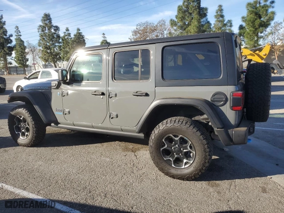 2022 Jeep Wrangler 4xe Unlimited Rubicon with VIN 1C4JJXR62NW172990, listed as a Copart auction lot 85297694 with 29,809 mi miles and Salvage Title. Bid and sale history available at carsss.com. Image 2.