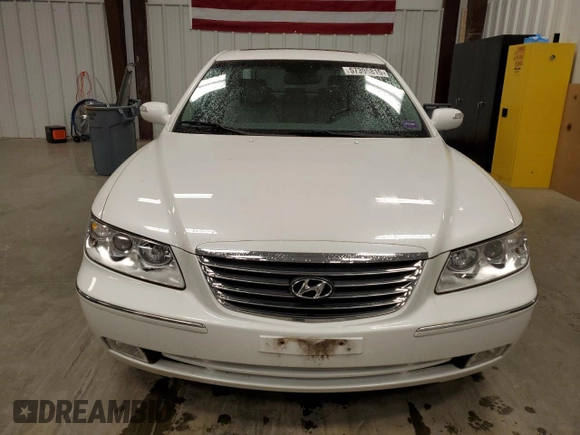 2009 Hyundai Azera Limited z VIN KMHFC46F29A371099, wystawiony jako Copart lot #57395815 z przebiegiem 69 313 mil mil oraz Szkoda całkowita • Salvage title. Historia ofert i sprzedaży dostępna na DreamBid. Obrazek 5.