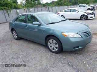 2007 Toyota Camry CE z VIN 4T1BE46K97U544599, wystawiony jako IAAI lot #42529509 z przebiegiem 80 523 mil mil oraz . Historia ofert i sprzedaży dostępna na DreamBid. Obrazek 1.
