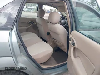 2004 Ford Focus ZTS with VIN 1FAFP38Z74W117402, listed as a IAAI auction lot 42035928 with 113,393 mi miles and . Bid and sale history available at carsss.com. Image 8.