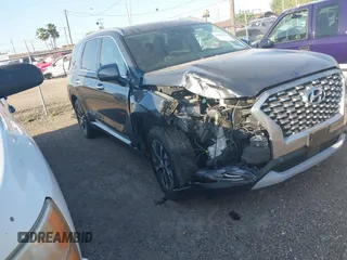 2021 Hyundai Palisade SEL z VIN KM8R24HE1MU194945, wystawiony jako IAAI lot #41987070 z przebiegiem 77 331 mil mil oraz . Historia ofert i sprzedaży dostępna na DreamBid. Obrazek 1.
