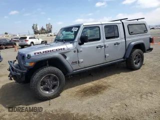 2021 Jeep Gladiator Rubicon с VIN 1C6JJTBG4ML534725, выставлен на аукционе Copart как лот 53990494 с пробегом 37 478 миль миль и Списание • Salvage title. История ставок и продаж доступна на DreamBid. Изображение 1.
