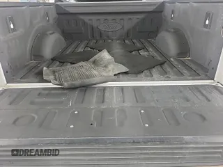 2018 Ford F-150 XL with VIN 1FTEW1E59JKD11351, listed as a IAAI auction lot 42663848 with 128,761 mi miles and . Bid and sale history available at DreamBid. Image 6.