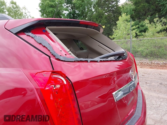2016 Cadillac SRX Premium Collection z VIN 3GYFNDE37GS525186, wystawiony jako IAAI lot #42179497 z przebiegiem 117 200 mil mil oraz . Historia ofert i sprzedaży dostępna na DreamBid. Obrazek 20.