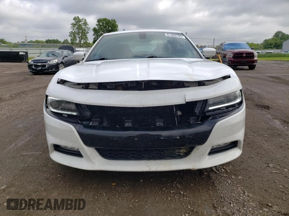 2015 Dodge Charger SXT with VIN 2C3CDXHG4FH832400, listed as a Copart auction lot 61493795 with 134,582 mi miles and Salvage title. Bid and sale history available at DreamBid. Image 5.