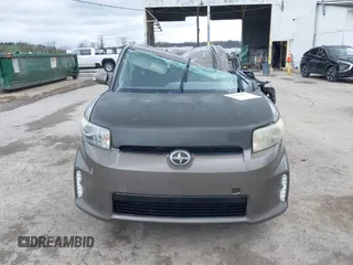 2014 Scion xB with VIN JTLZE4FE9EJ050596, listed as a IAAI auction lot 41884572 with 141,896 mi miles. Bid and sale history available at carsss.com. Image 12.
