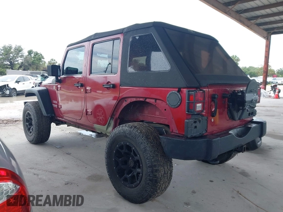 2012 Jeep Wrangler Unlimited Sport z VIN 1C4BJWDG3CL207291, wystawiony jako IAAI lot #42211454 z przebiegiem 110 864 mil mil oraz . Historia ofert i sprzedaży dostępna na DreamBid. Obrazek 3.