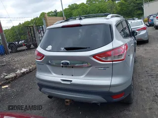2015 Ford Escape Titanium z VIN 1FMCU9J91FUA85771, wystawiony jako IAAI lot #42306986 z przebiegiem 135 787 mil mil oraz . Historia ofert i sprzedaży dostępna na DreamBid. Obrazek 16.