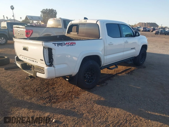 2023 Toyota Tacoma 4WD SR with VIN 3TMCZ5AN8PM647845, listed as a IAAI auction lot 41371634 with 21,917 mi miles. Bid and sale history available at carsss.com. Image 4.