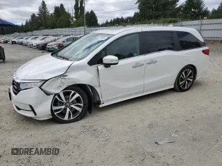 2022 Honda Odyssey Touring with VIN 5FNRL6H8XNB016064, listed as a Copart auction lot 65289595 with 24,946 mi miles and Salvage title. Bid and sale history available at DreamBid. Image 1.