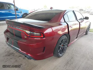 2020 Dodge Charger Scat Pack with VIN 2C3CDXGJXLH132986, listed as a IAAI auction lot 41935340 with 58,162 mi miles. Bid and sale history available at carsss.com. Image 4.