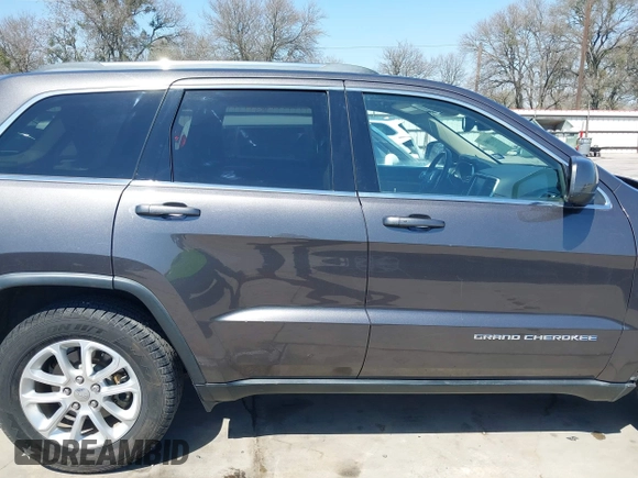 2015 Jeep Grand Cherokee Altitude with VIN 1C4RJEAG0FC952260, listed as a IAAI auction lot 41738692 with 124,197 mi miles. Bid and sale history available at carsss.com. Image 14.