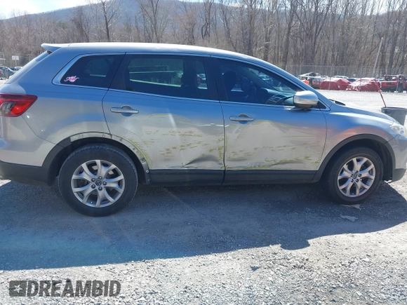 2015 Mazda CX-9 Sport with VIN JM3TB2BA7F0450544, listed as a IAAI auction lot 41812565 with 81,727 mi miles and . Bid and sale history available at carsss.com. Image 13.