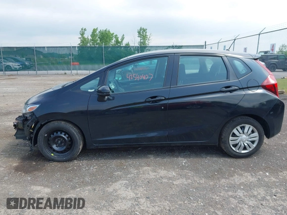 2015 Honda Fit LX with VIN 3HGGK5H56FM724269, listed as a IAAI auction lot 42540407 with 113,702 mi miles and . Bid and sale history available at DreamBid. Image 13.