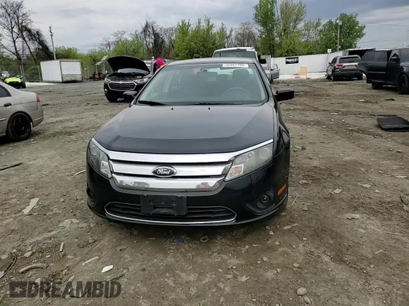 2012 Ford Fusion SE with VIN 3FAHP0HAXCR291550, listed as a Copart auction lot 52867765 with 134,162 mi miles and Salvage title. Bid and sale history available at DreamBid. Image 11.