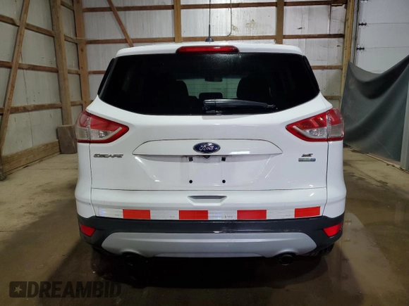 2014 Ford Escape SE with VIN 1FMCU9G98EUC19083, listed as a Copart auction lot 63421915 with 108,042 mi miles and Clean title. Bid and sale history available at DreamBid. Image 6.