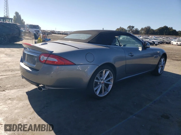 2014 Jaguar XK Touring with VIN SAJWA4EB1ELB54493, listed as a Copart auction lot 71494604 with 73,282 mi miles and Salvage Title. Bid and sale history available at carsss.com. Image 3.