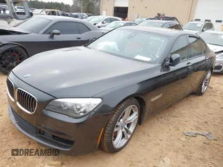 2014 BMW 7 Series 750i с VIN WBAYA8C55ED228448, выставлен на аукционе IAAI как лот 41350013 с пробегом 97 829 миль миль и . История ставок и продаж доступна на DreamBid. Изображение 2.